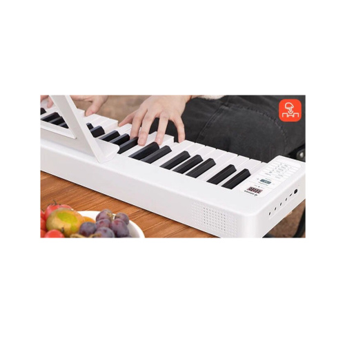 Donner DP-06 цифровое складное пианино, 61 клавиша 32 полифония 128 тембр, 128 стилей фото 10